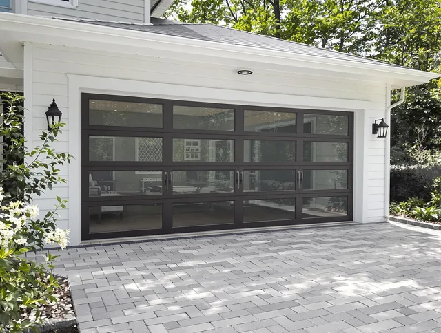 Trumbull Garage Door Repair design specialist presenting custom garage door options to Trumbull homeowner