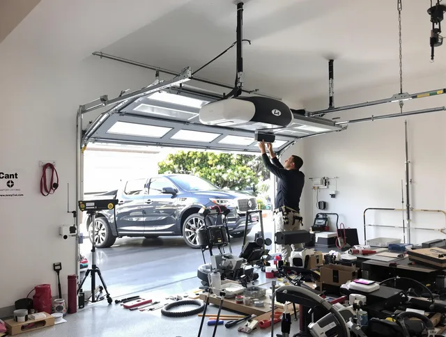 Trumbull Garage Door Repair specialist installing smart garage door opener system in Trumbull home