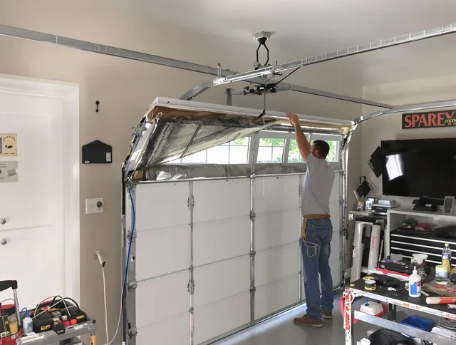 Garage door section replacement by Trumbull Garage Door Repair in Trumbull