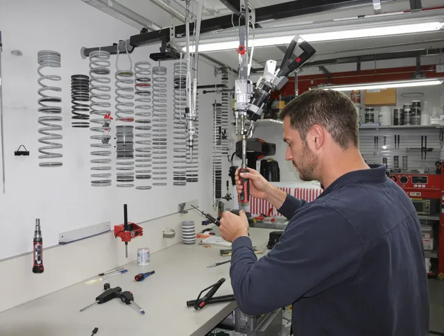 Trumbull Garage Door Repair safety certified technician performing precision spring replacement in Trumbull